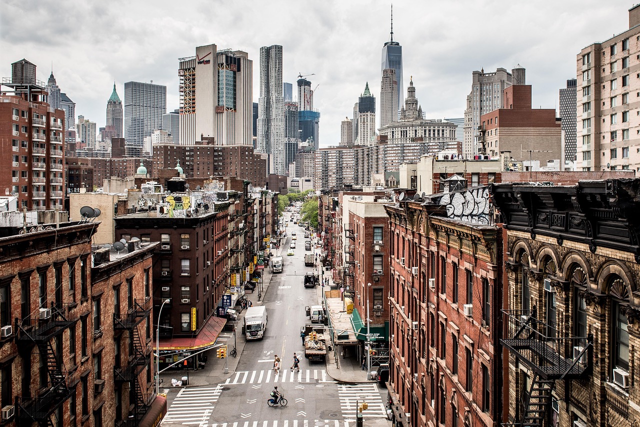 Image of historic downtown buildings in foreground and modern high rise buildings in background