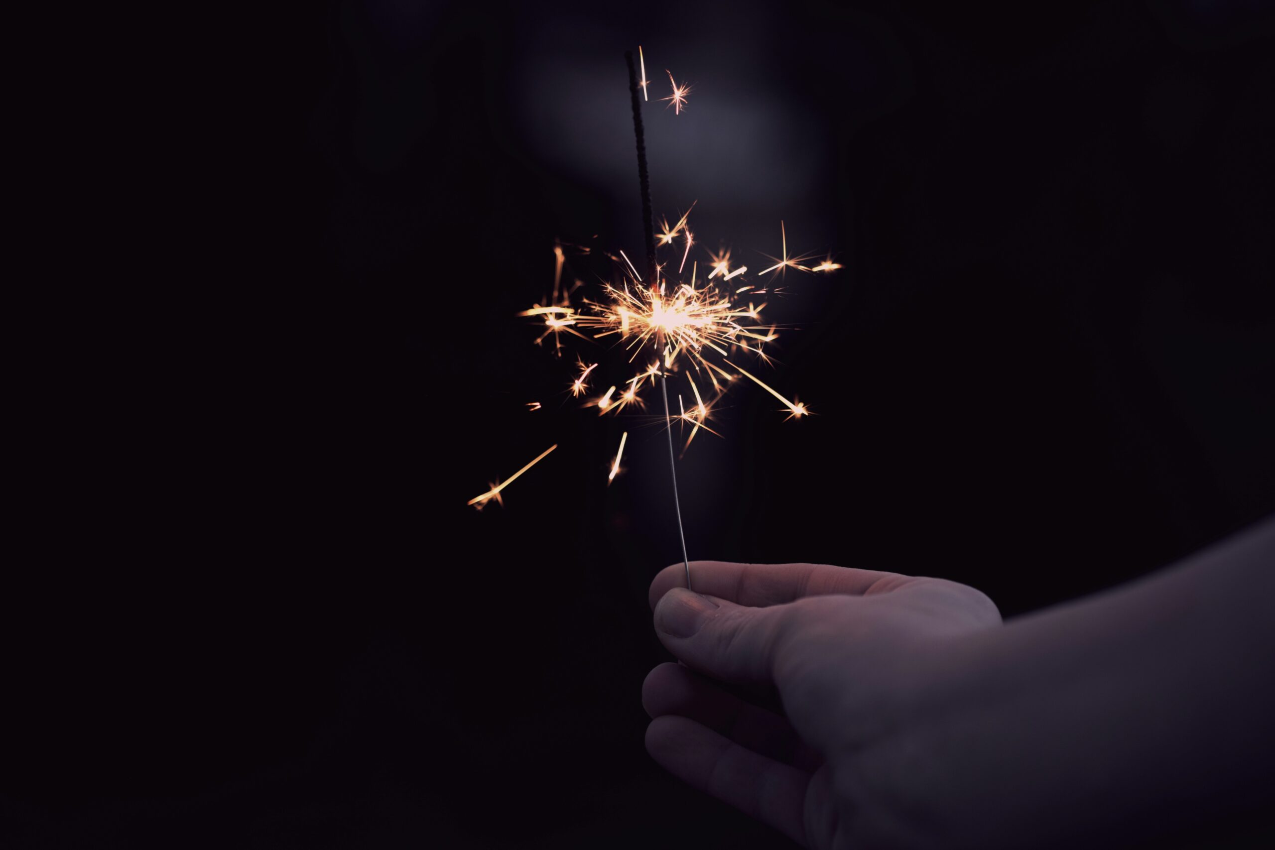 Person holding a sparkler