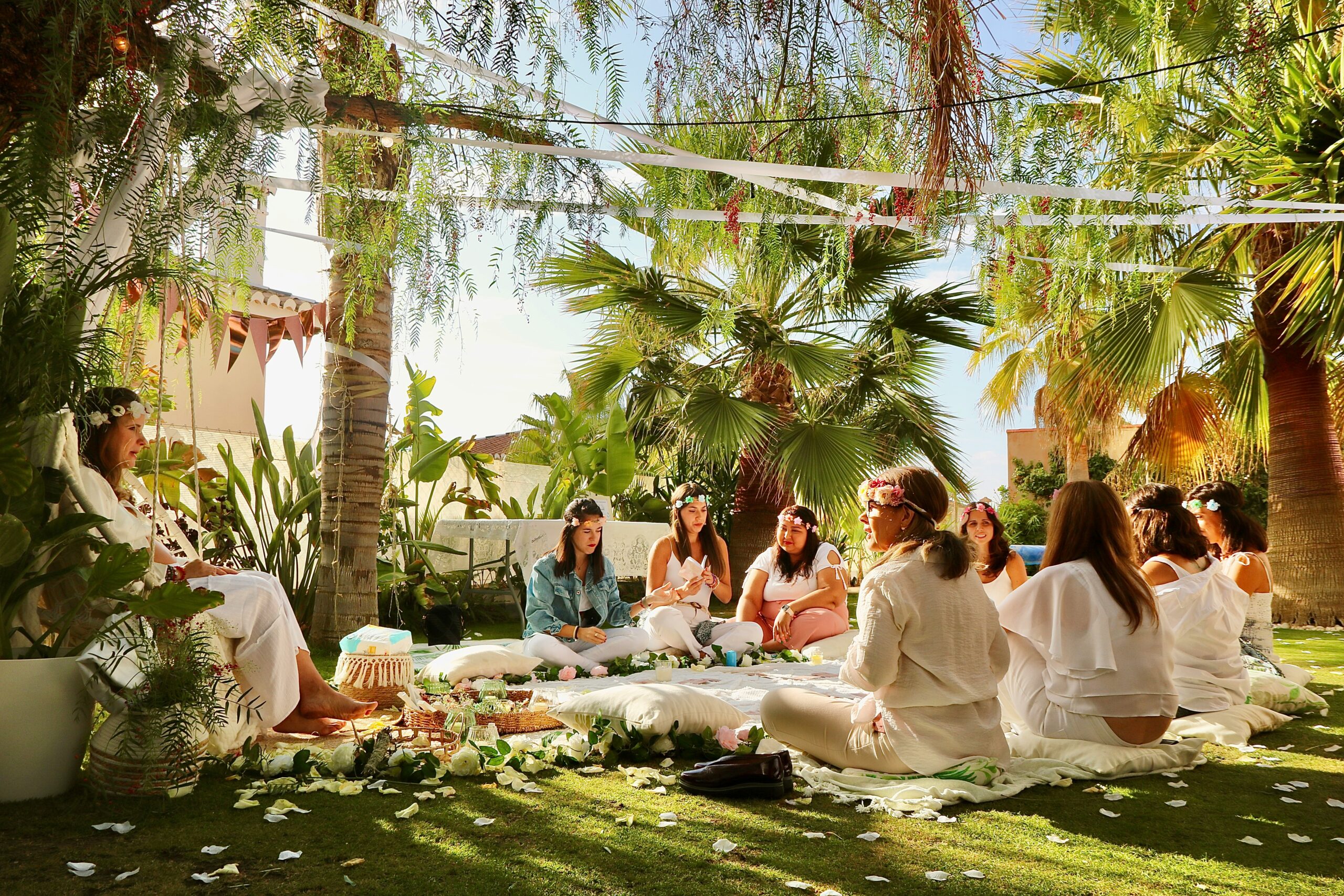 group of women in a tropical location